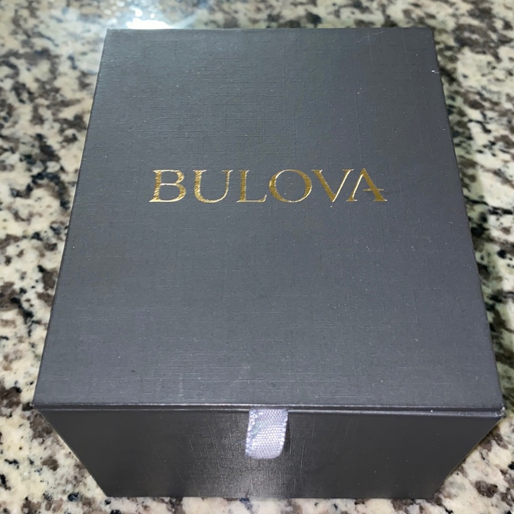 Brand new Bulova silver with blue face
